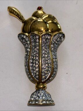 ICE CREAM SUNDAE BROOCH GOLD TONED WITH RHINESTONES HAS A SPOON CREAM AND CHERRY